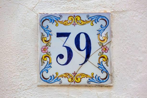 istock Old Weathered House Number 39, Tile on Wall 1474354652
