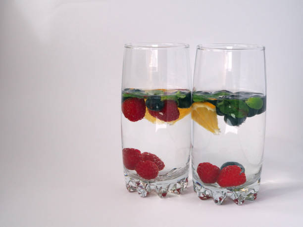 istock Detox water with orange, blueberry, raspberry, and mint 1474357667