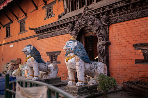 Lion statue infant of Patan Durbar Square, is situated at the centre of the city of Lalitpur. It's former ancient royal palace and a marvel of Newar architecture