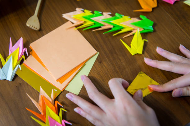 istock Folding thousand cranes for sick person 1474361821