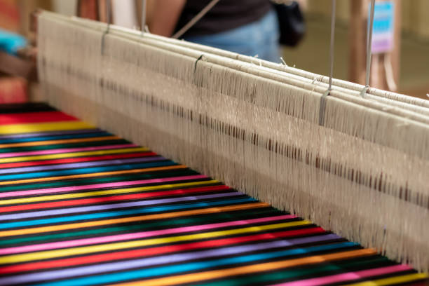 istock The yarn prepared inside the weaving machine is preparation for weaving local fabrics because local fabrics are handmade and have a high price because it takes quite a long time to weave. 1474362574