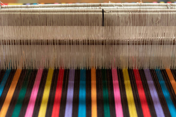 istock The yarn prepared inside the weaving machine is preparation for weaving local fabrics because local fabrics are handmade and have a high price because it takes quite a long time to weave. 1474362588