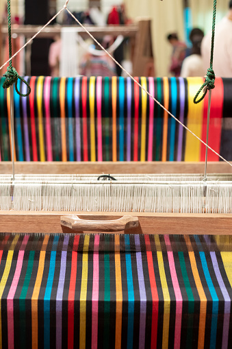 The yarn prepared inside the weaving machine is preparation for weaving local fabrics because local fabrics are handmade and have a high price because it takes quite a long time to weave.