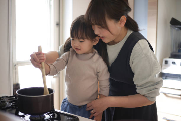 istock parent and child cooking 1474364075