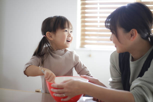 istock parent and child cooking 1474364134