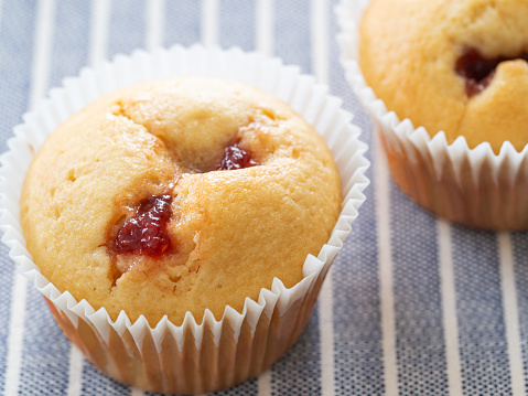 Strawberry jam muffins on plate