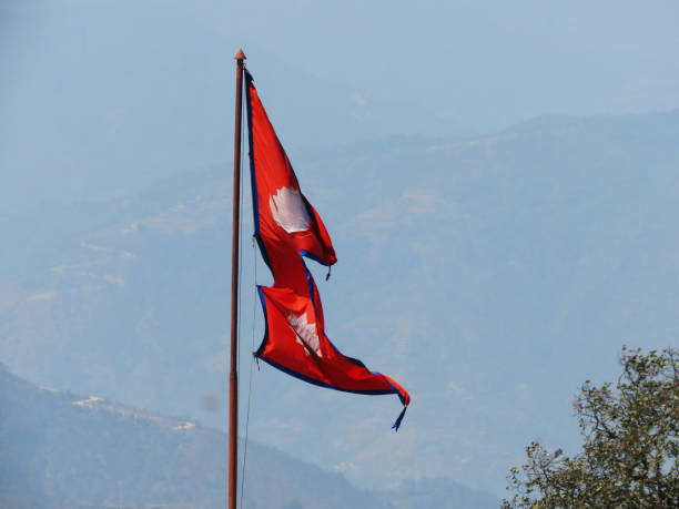 Flag of Nepal The national flag of Nepal is the world's only non-quadrilateral flag stock photo