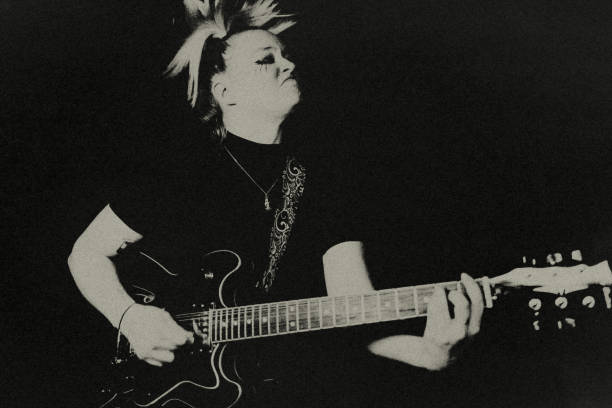 istock The female rock musician. 1474367238