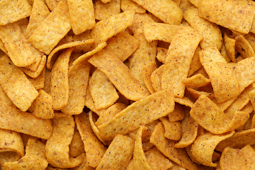 a heap of rectangular corn chips for frito pie
