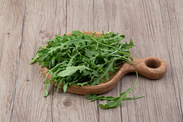 istock Green fresh rucola or arugula leaf isolated 1474370932