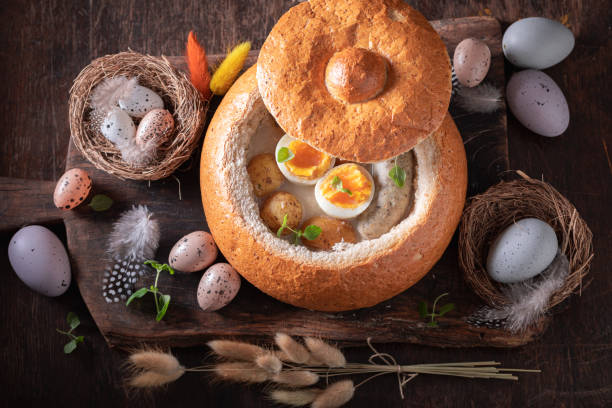 istock Hot sour soup in Easter bread as a bowl. 1474372296