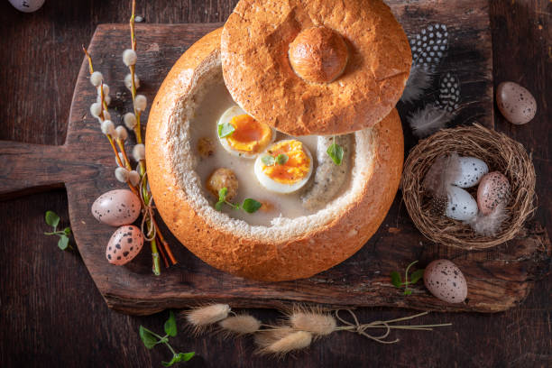 istock Traditional sour soup in Easter bread as a bowl. 1474373247