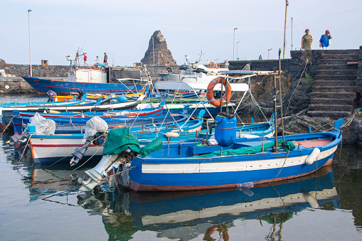 Luxurious villas close to a marina with fishing boats at the Pacific coast near Manzanillo, Colima, Mexico.