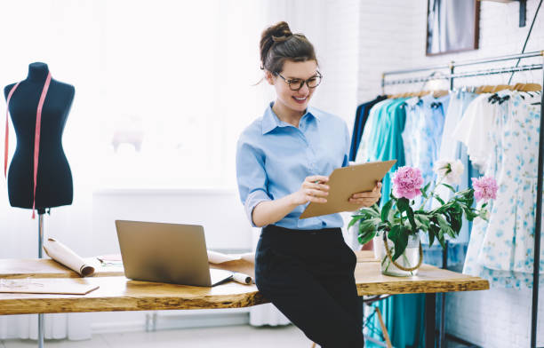 istock Positive female designer working in atelier 1474377713