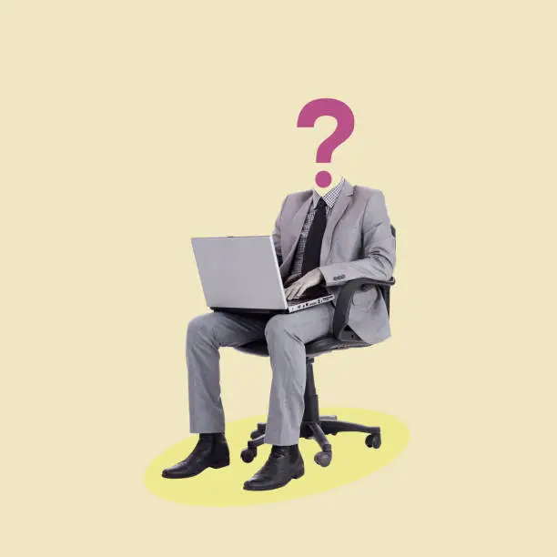 Photo of Creative Art collage of a man with a head shaped like a question mark sitting on an office chair with a laptop.