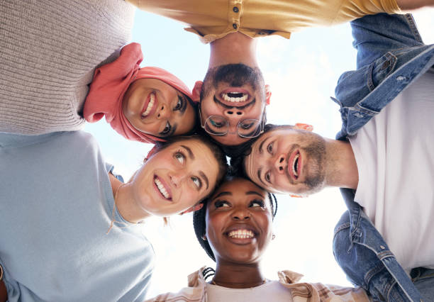 istock Diversity, partnership or happy students with goals, educational community or hope for future success. Faces, funny or school friends on university or college campus with a group mission or vision 1474378391