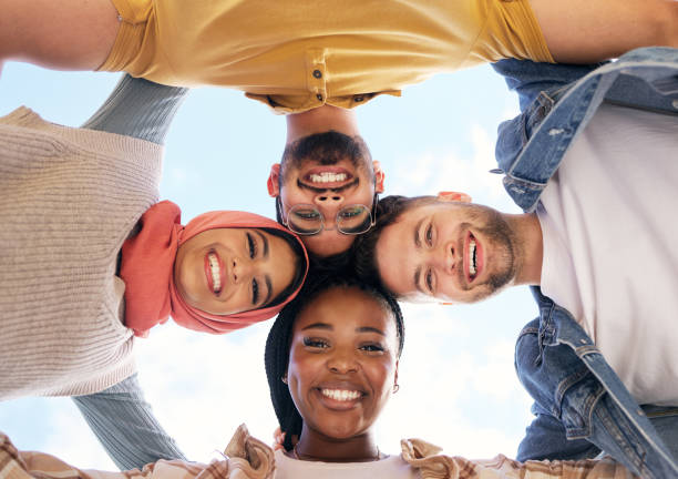 istock Support, portrait or happy students with goals, educational community or hope for future success. Diversity, low angle or friends in university or college planning a social group mission or vision 1474378400