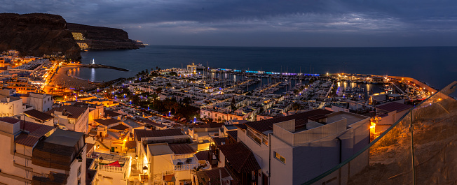 Panoramic night view of the sea town of Mogan, in Gran Canaria, Spain