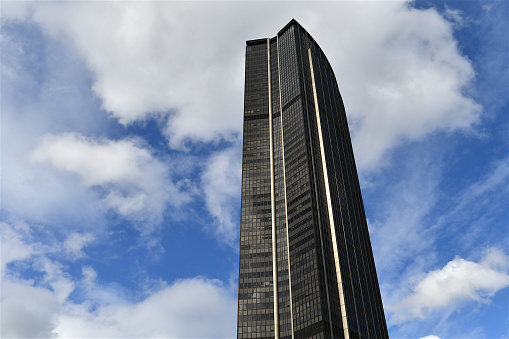 Paris, France-03 18 2023: The Tour Maine-Montparnasse, is an office skyscraper located in the Montparnasse area of Paris. Constructed from 1969 to 1973, it was the tallest skyscraper in France until 2011.