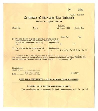 An old British certificate of pay and tax deducted for the income tax year 1967-1968. The recipient worked for an engineering company and earned £1,185.17s.3d during that year. He paid tax of £89.3s.0d and his pensions contributions amounted to £9.5s.6d. (All identifying details have been removed.)