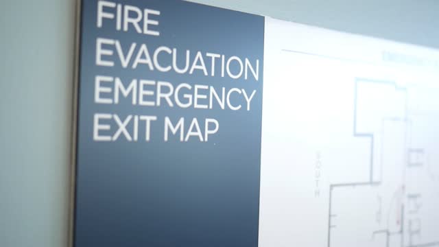 Emergency Fire Evacuation Map on Wall