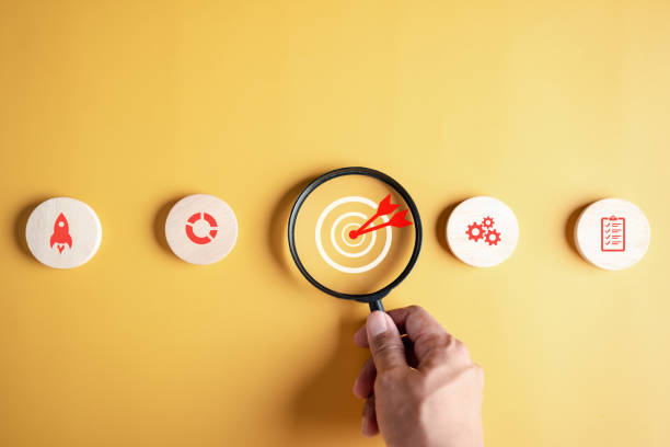 istock Magnifying glass focus to target icon which for planning development leadership and customer target group to success business corporate concept. 1474391880