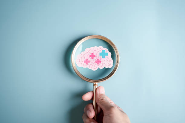 istock Magnifier focus to human brain icon and plus sign positive thinking concept, idea creative intelligence thinking or Awareness of Alzheimer, Parkinson's disease, dementia, stroke, mental health care. 1474391882