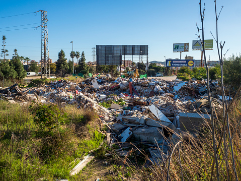 Fuengirola, Malaga, Spain. 03/13/2023.    Waste of all kinds piled up near a road in Fuengirola.