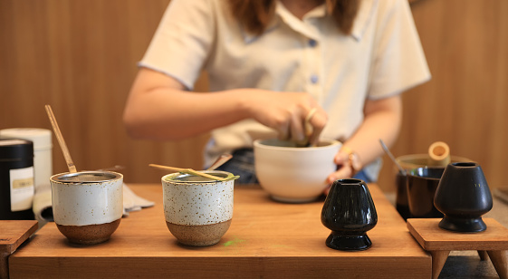 Woman make matcha tea, Japanese tea
