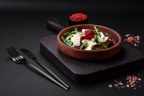 istock Delicious fresh mozzarella and boiled beets cut into slices 1474400055