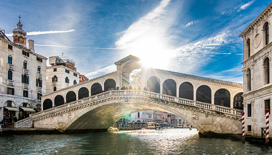historic buildings at the canal grande and the Rialto Bridge in the old town of Venice
