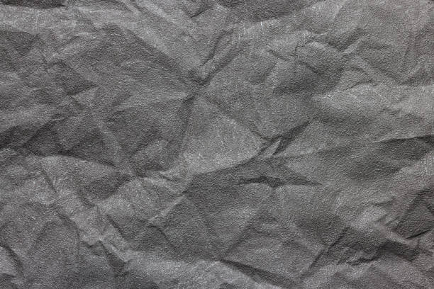 istock Crumpled paper background with copy space 1474404945