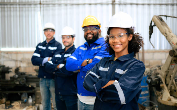 istock Group of confident worker team at factory 1474406129