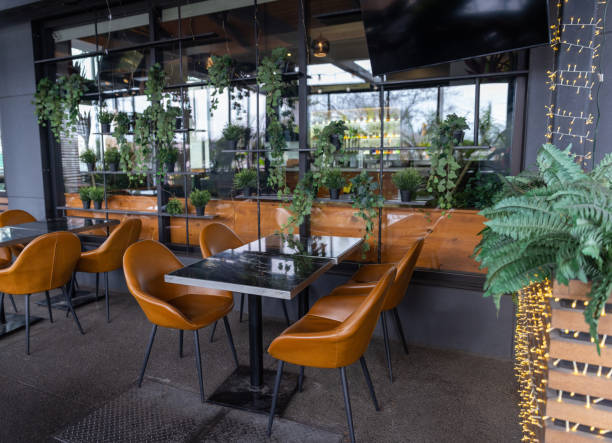istock Interior of Modern Cafe with an Outdoor Dining Zone 1474406470