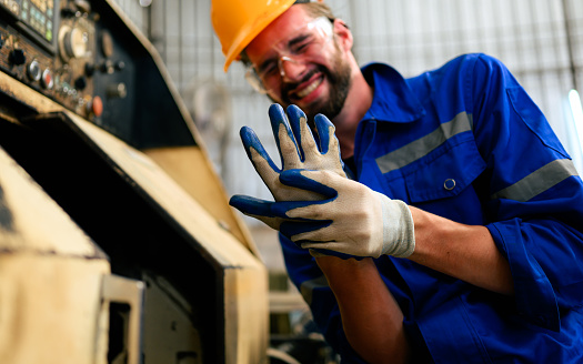 Engineer worker with accident at factory, Worker with injury from machine working