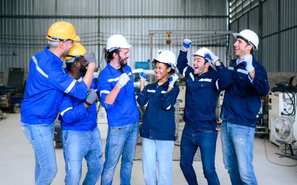 istock Group of successful worker working at factory with happiness 1474408492
