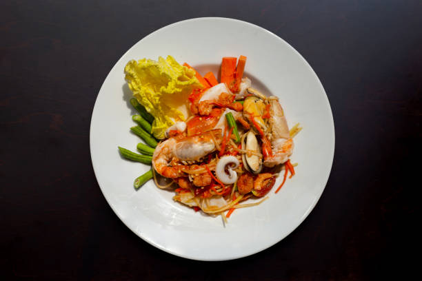 istock Spicy papaya salad with seafood 1474409723