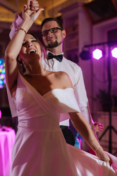 istock the first dance of the bride and groom inside a restaurant 1474410861