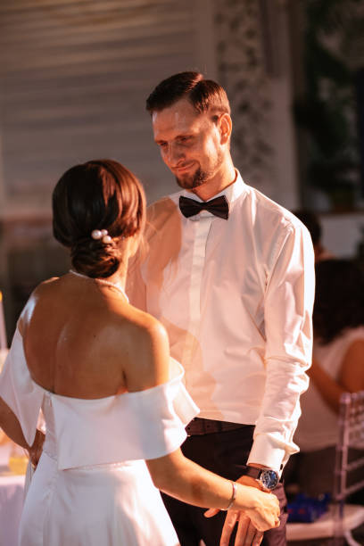 istock the first dance of the bride and groom inside a restaurant 1474415885