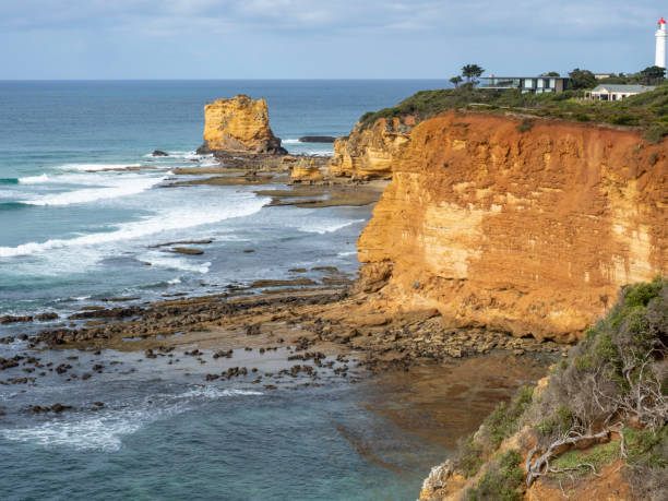istock Clifftop houses and light house 1474419392