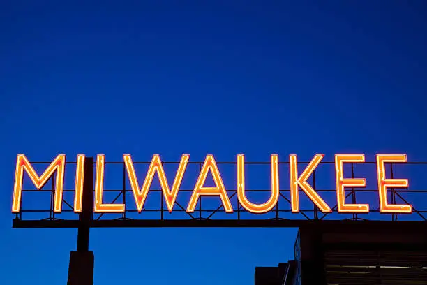 Red Milwaukee sign in downtown of the city.