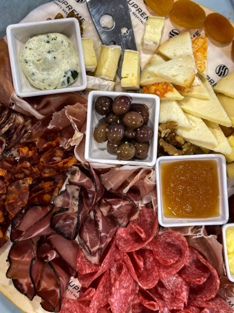 istock Cheese platter with different sorts of Cheese and ham with jam 1474426675