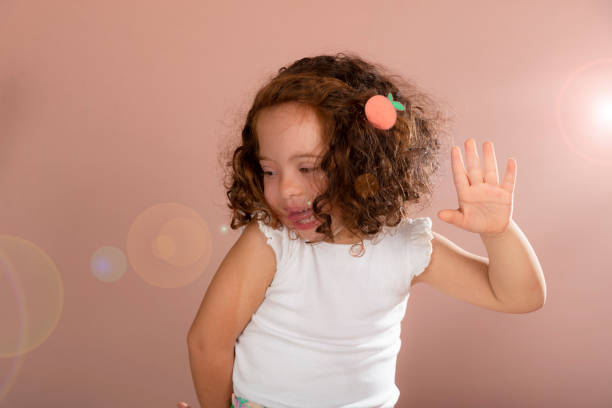 istock Cheerful red-haired girl making hand gesture to the camera. 1474431477