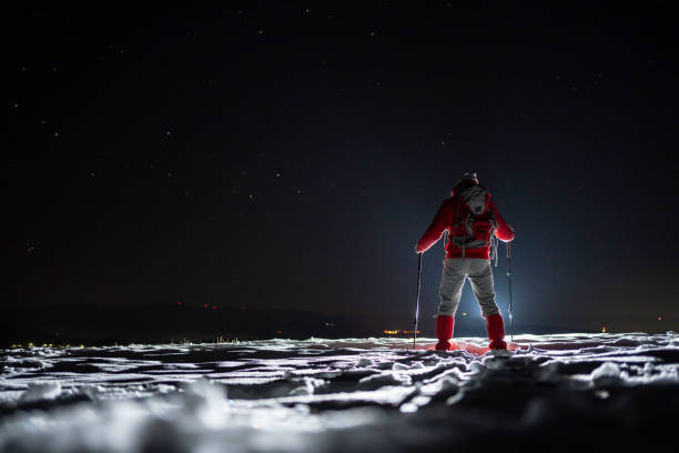 istock Winter outdoor workout. Man training at night. 1474437355
