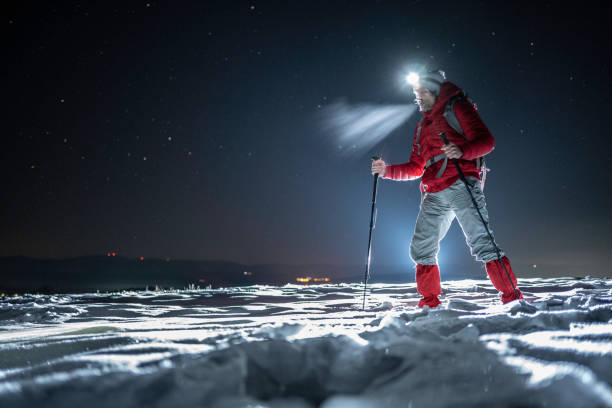 istock Winter outdoor workout. Man training at night. 1474437356