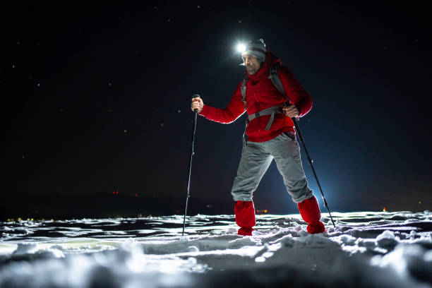 istock Winter outdoor workout. Man training at night. 1474437361