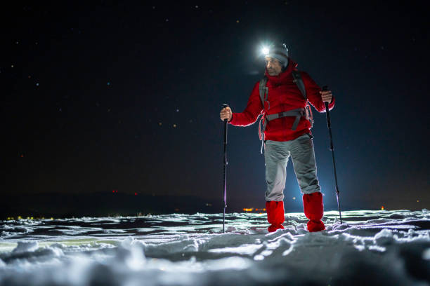 istock Winter outdoor workout. Man training at night. 1474437364