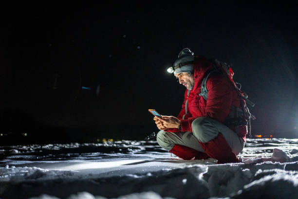 istock Winter outdoor workout. Man training at night. 1474437367