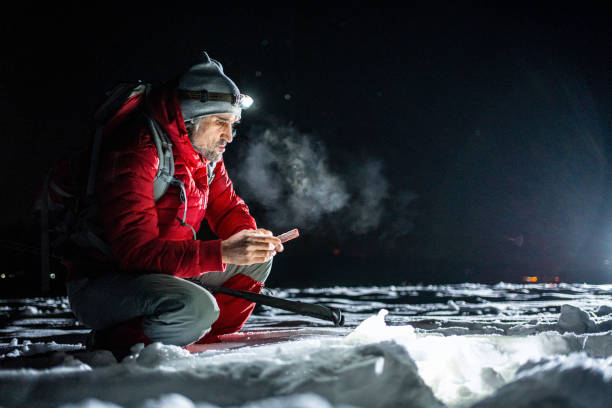 istock Winter outdoor workout. Man training at night. 1474437369