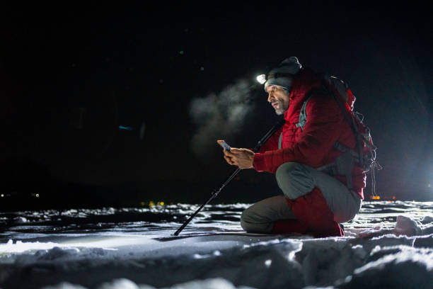 istock Winter outdoor workout. Man training at night. 1474437379
